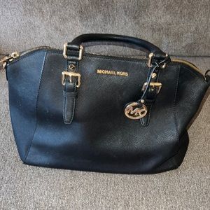 Black and gold Michael Kors handbag
